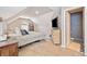 Bedroom featuring a bed, dresser, and television at 137 Hidden Lake Cir, Canton, GA 30114