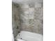 Bathroom featuring a tiled shower and tub combination at 273 Fennel Way, Atlanta, GA 30331