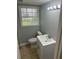 Bathroom showcases a toilet and vanity with modern fixtures at 273 Fennel Way, Atlanta, GA 30331