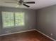 Bedroom features laminate floors and a window providing ample natural light at 273 Fennel Way, Atlanta, GA 30331