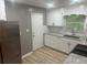 Well-lit kitchen featuring stainless steel appliances, granite countertops, and subway tile backsplash at 273 Fennel Way, Atlanta, GA 30331
