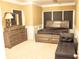 Spacious bedroom featuring stylish furnishings and ample room to relax and unwind at 1109 Norsworthy Ml, Hampton, GA 30228