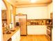 Well-equipped kitchen with granite countertops, stainless steel appliances, and plenty of cabinet space for storage at 1109 Norsworthy Ml, Hampton, GA 30228