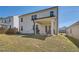 Back exterior featuring a yard, patio, grill, and string lights at 1936 Waycross Ln, Dacula, GA 30019