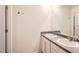 Bathroom featuring a double vanity with modern fixtures and a large mirror at 1936 Waycross Ln, Dacula, GA 30019