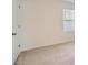 Bright bedroom featuring neutral walls, carpet and a window at 1936 Waycross Ln, Dacula, GA 30019