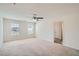 Spacious bedroom with carpet, natural light and ceiling fan at 1936 Waycross Ln, Dacula, GA 30019