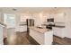 Modern kitchen featuring stainless steel appliances, granite countertops, and an island at 1936 Waycross Ln, Dacula, GA 30019