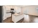 Modern kitchen with stainless steel appliances, granite countertops, and a kitchen island at 1936 Waycross Ln, Dacula, GA 30019
