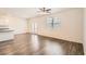 Open living room with hardwood floors, french doors and natural light at 1936 Waycross Ln, Dacula, GA 30019