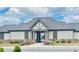 Attractive pool house with stone base and colorful landscaping, featuring gated access at 1936 Waycross Ln, Dacula, GA 30019