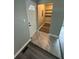 Tiled entryway leads to shelving for pantry storage and front door at 3730 Clovis Court Northwest Nw Ct, Atlanta, GA 30331