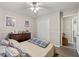 Bedroom with a queen sized bed, closet, and hardwood floors at 999 Chestnut Oak Ct, Lawrenceville, GA 30046