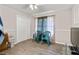 Bedroom with hardwood floors, ceiling fan, and ample natural light at 999 Chestnut Oak Ct, Lawrenceville, GA 30046