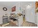 Kitchen with breakfast bar and updated appliances at 999 Chestnut Oak Ct, Lawrenceville, GA 30046