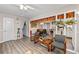 Bright living room with vinyl floors and views of the dining area and kitchen at 999 Chestnut Oak Ct, Lawrenceville, GA 30046