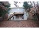 Large backyard with deck, stairs, trees, and plenty of space for entertaining at 6674 Mimosa Cir, Tucker, GA 30084
