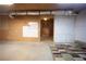 Unfinished basement showcasing potential for customization with concrete flooring and utilities at 6674 Mimosa Cir, Tucker, GA 30084