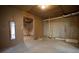 Unfinished basement featuring concrete floor, exposed utilities and framed walls at 6674 Mimosa Cir, Tucker, GA 30084