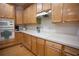 A bright kitchen with modern appliances, lots of cabinet space and white backsplash, perfect for cooking at 6674 Mimosa Cir, Tucker, GA 30084
