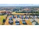 Scenic aerial view of the neighborhood's proximity to green spaces and wooded areas at 1049 Bodega Loop, Locust Grove, GA 30248