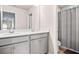 Bright bathroom with double sink vanity and separate toilet/shower area at 1049 Bodega Loop, Locust Grove, GA 30248