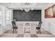 Elegant dining room featuring stylish decor, modern lighting, and a chic glass table at 1049 Bodega Loop, Locust Grove, GA 30248
