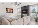 Comfortable living room with stylish decor, a cozy couch, and a modern fireplace at 1049 Bodega Loop, Locust Grove, GA 30248