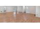 Open living space with hardwood floors, neutral walls, and access to the backyard at 1051 Rock Springs Rd, Lawrenceville, GA 30043