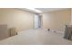 A well lit room with tile flooring and neutral-colored walls at 1051 Rock Springs Rd, Lawrenceville, GA 30043