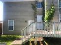 Two-story house with deck and backyard at 883 Pine Shoals Dr, Atlanta, GA 30349