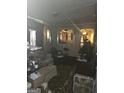 Inviting room featuring a comfortable couch, mirror, and a fan for relaxation at 212 Little St, Atlanta, GA 30315