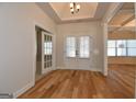 Bright entryway with hardwood floors and French doors at 329 Rays Ct # 12, Grayson, GA 30017