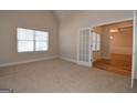 Spacious office with hardwood floors and French doors at 329 Rays Ct # 12, Grayson, GA 30017