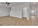 The spacious living room features wood-look floors and easy access to other rooms at 271 Orwell Dr # 49, Social Circle, GA 30025