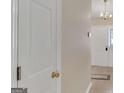 White interior door with brass hardware at 4234 Stillwater Dr, Duluth, GA 30096