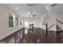 Bright living room with hardwood floors, fireplace, and large windows at 2632 Oakdale Nw St, Atlanta, GA 30318