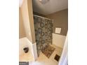 Simple bathroom with shower and neutral decor at 215 Sims St, Palmetto, GA 30268
