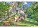 Exterior view of home showing side elevation and deck at 212 Sims St, Palmetto, GA 30268