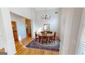 Formal dining room with natural light and views to the kitchen at 1461 Hada Ln, Lawrenceville, GA 30043
