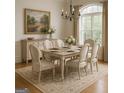 Formal dining room with modern chandelier and stylish furnishings at 1461 Hada Ln, Lawrenceville, GA 30043
