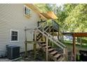 Wooden deck and stairs leading to the backyard at 73 Azalea Dr, Villa Rica, GA 30180