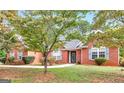 Brick house with walkway and landscaping at 716 Euel Dr, Mcdonough, GA 30252