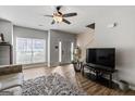 Bright and airy living room with lots of natural light, featuring sleek wood floors at 2783 Parkway Cv, Lithonia, GA 30058