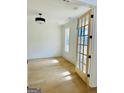 Home office with hardwood floors and French doors at 140 Dockside Dr # 381, Fayetteville, GA 30215