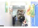 Bright entryway with stone fireplace and view of living room at 9388 Crest Knoll Ct, Jonesboro, GA 30238