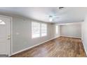Living room featuring hardwood floors and an open floor plan at 1092 W Adrian Sw Cir, Conyers, GA 30094