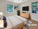 Cozy bedroom with soothing colors, soft textures and ample sunlight at 828 Pinevalley Dr, Forest Park, GA 30297