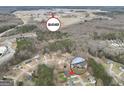 Expansive aerial view of the property, showcasing its location near Atlanta Motor Speedway and surrounding community at 130 Nicki Ct, Hampton, GA 30228