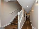 Hallway with wood floors and stairs at 6 Alston Ne Pl, Atlanta, GA 30324